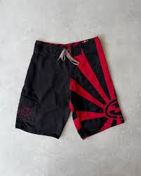 Red Sun Andy Irons-era boardshort reference in black / red